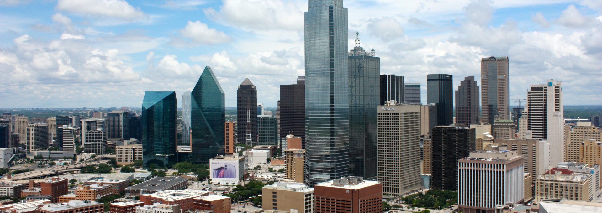 city buildings under blue sky during daytime